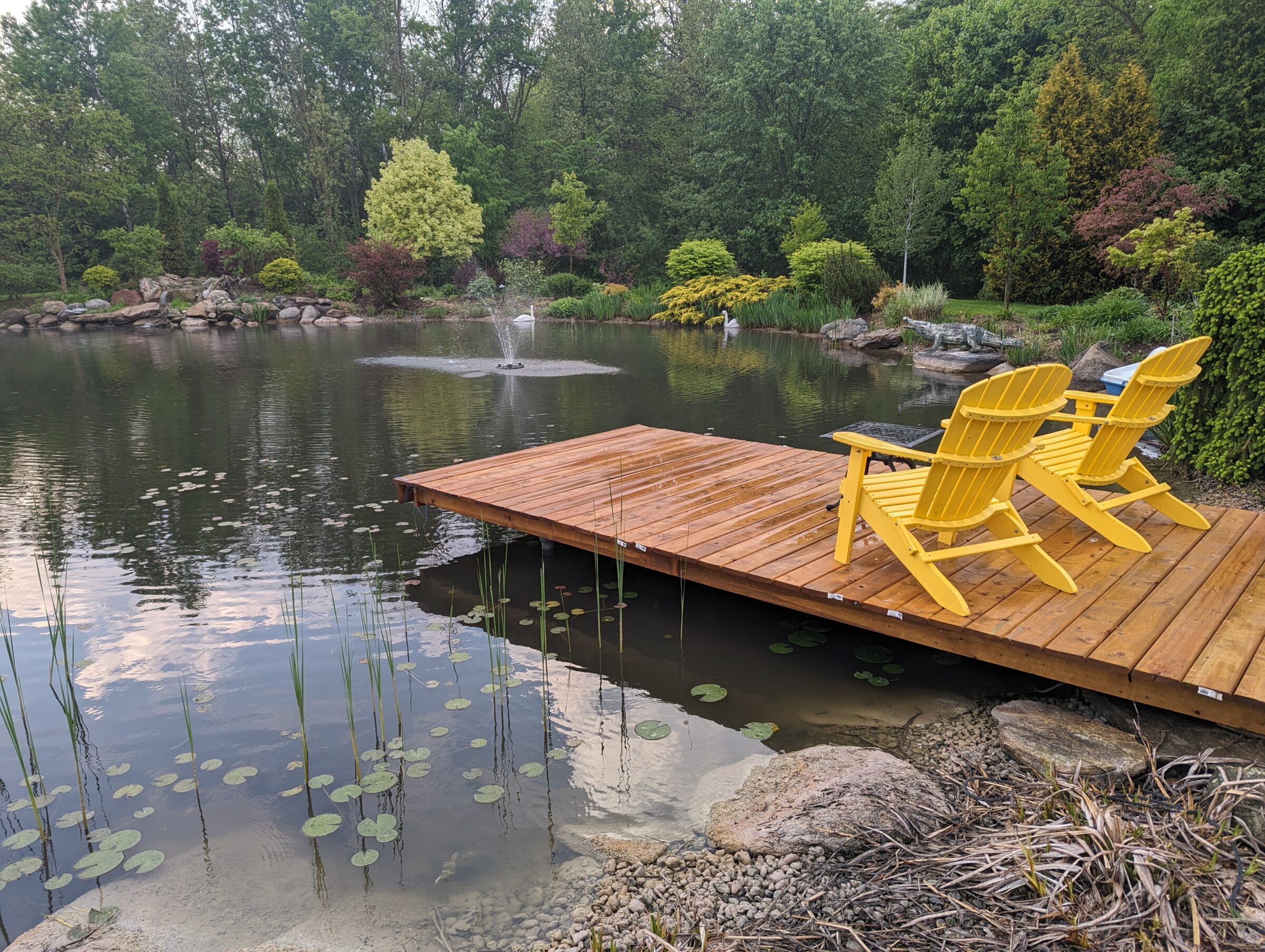 Natural pond and green landscaping